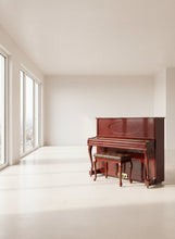 Load image into Gallery viewer, Upright piano with a bench in a white room