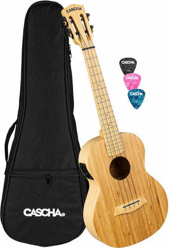Cascha bamboo ukulele with black carrying case and coloured picks on a white background