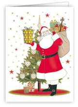 Load image into Gallery viewer, Vintage-style Christmas card with Santa Claus holding a gift and standing next to a decorated tree.
